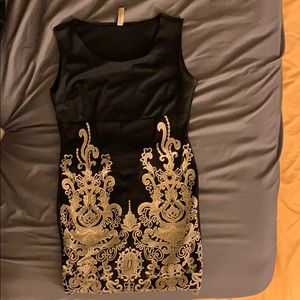 Black and gold fitted dress